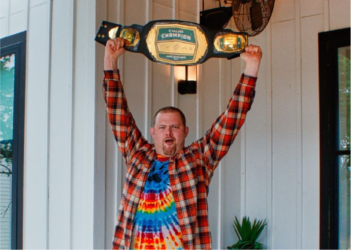 Eric With ZSuite Championship Belt